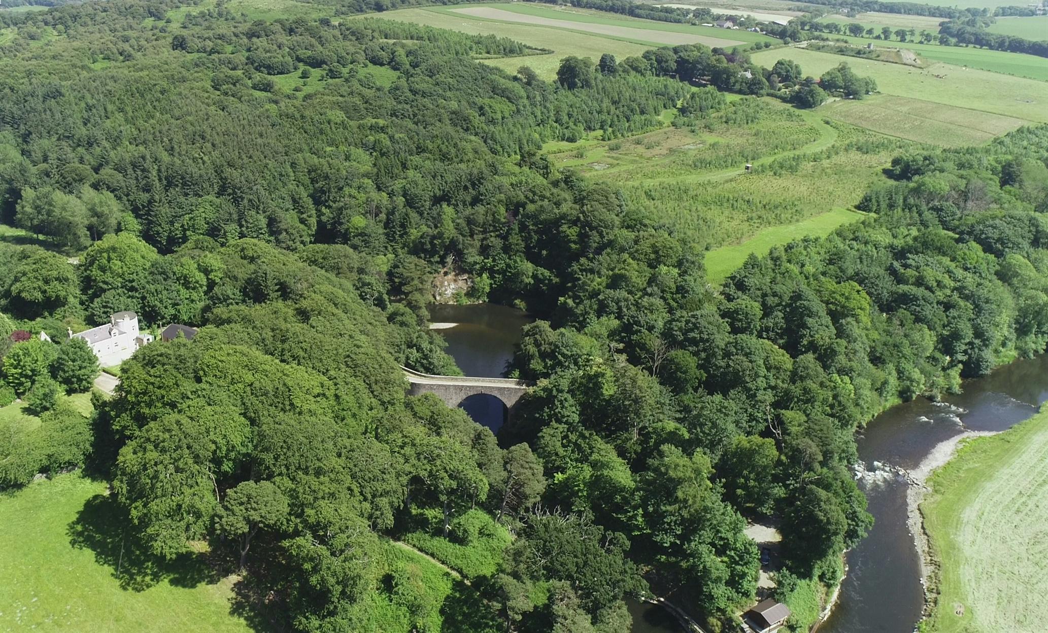 Craig cottage aerial view and private bridge of alvah