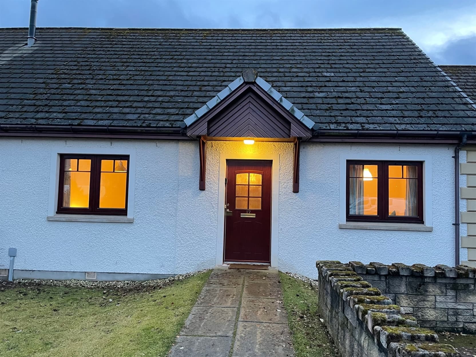 The front of Taigh Munro, Aviemore with ramp access to front door